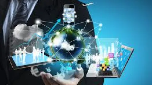 Businessman holding digital images of globe and technology icons.